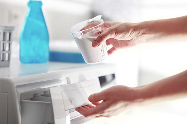 Liquid detergent treatment for a sunscreen stain on white fabric